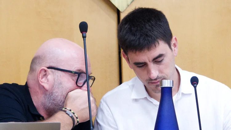 Marc Serradó i Jordi Parent murmurant