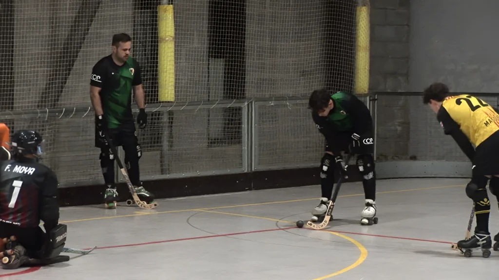 Club Olesa Patí en una jugada d'un partit / Club Olesa Patí